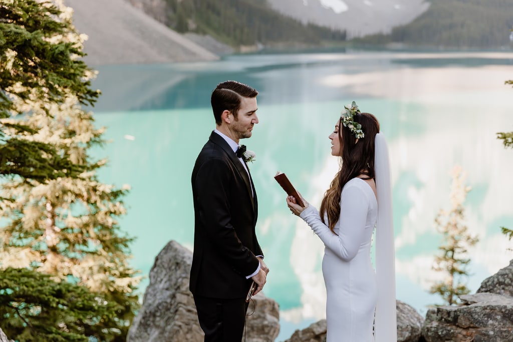 eloping in Moraine Lake reading vows