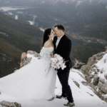 Couple kissing on the mountain top